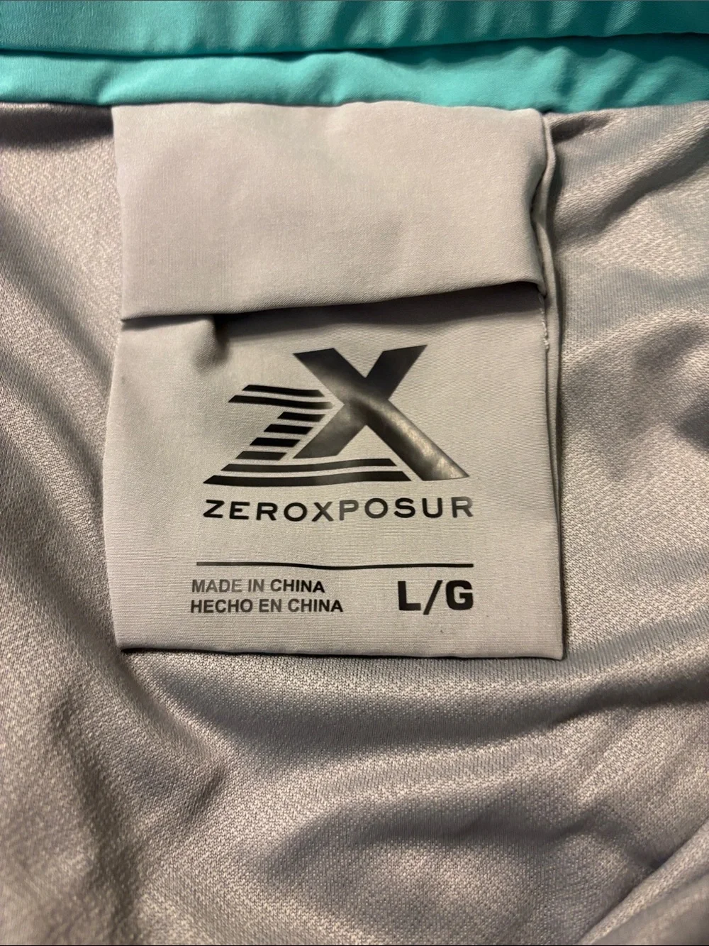 Men's Zeroxposur Swim Trunks in Teal and Black Stripe